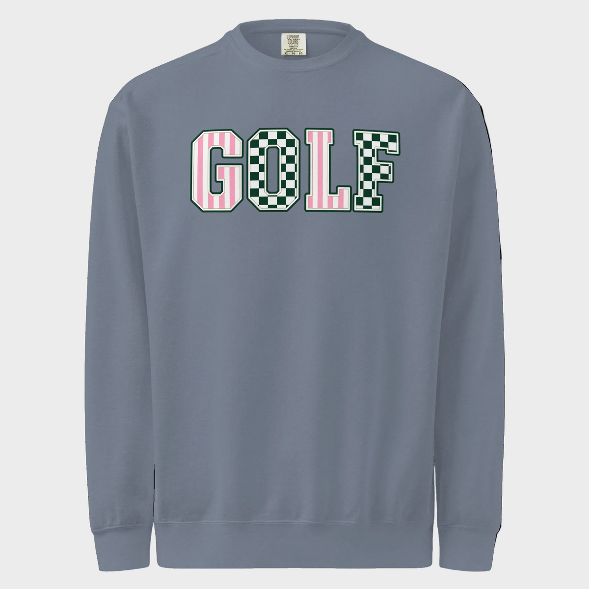 A slate blue crewneck sweatshirt featuring the word 'GOLF' across the chest in collegiate block letters. The letter 'G' is filled with pink vertical stripes, 'O' and 'L' are filled with a green and white checkerboard pattern, and 'F' is filled with a pink and white checkerboard pattern.